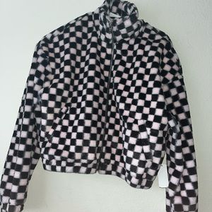 Checkered black and pink zip up with pockets , and a turtle neck